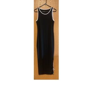 NWOT SIMPLE LONG BLACK LIGHTLY RIBBED DRESS WITH SHORT SLIT ON ONE SIDE!